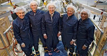 Kim Shiflett/nasa; Neil Armstrong/NASA/AP Photo